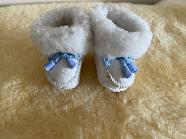 White sheepskin Baby Boot with Blue lace
